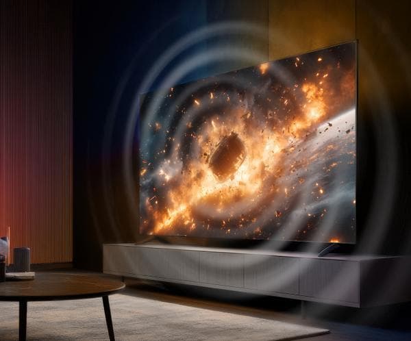 A TV in a room with circles illustrating the sound filling the room